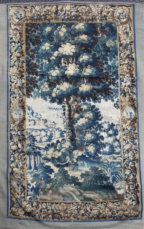 An early 17th century Brussels verdure tapestry, overall 8ft 6in. x 5ft 11in.